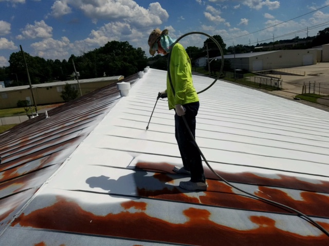 GE-MOMENTIVE SILICONE APPLIED TO RUSTED ROOF