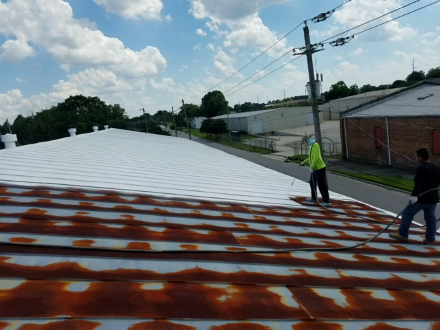 GE-MOMENTIVE SILICONE APPLIED TO RUSTED ROOF